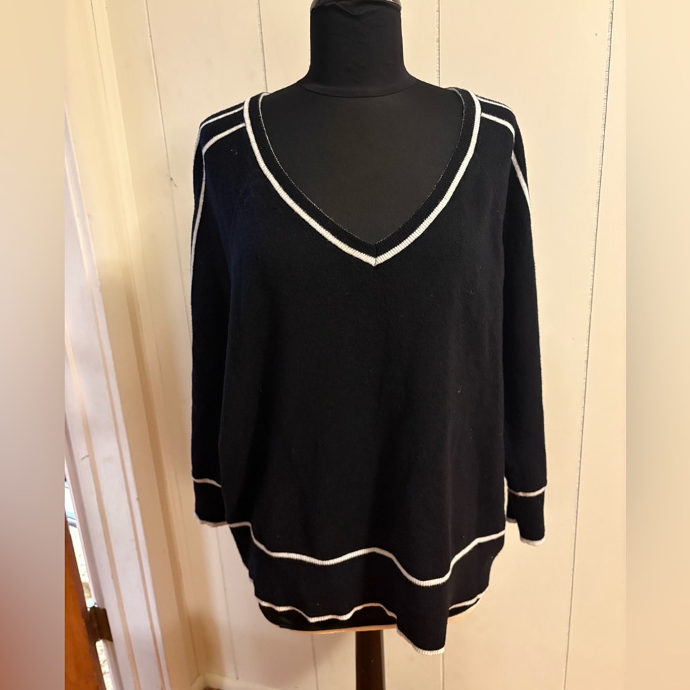 Chic Black V-Neck Sweater with White Accents
